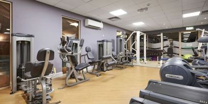 Fitness center with treadmills, machines and equipment at the DoubleTree by Hilton Newbury North.