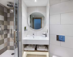 Guest bathroom with shower at Hampton By Hilton Torquay.