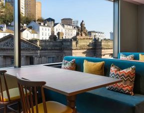 Dining area with a view at Hampton By Hilton Torquay.