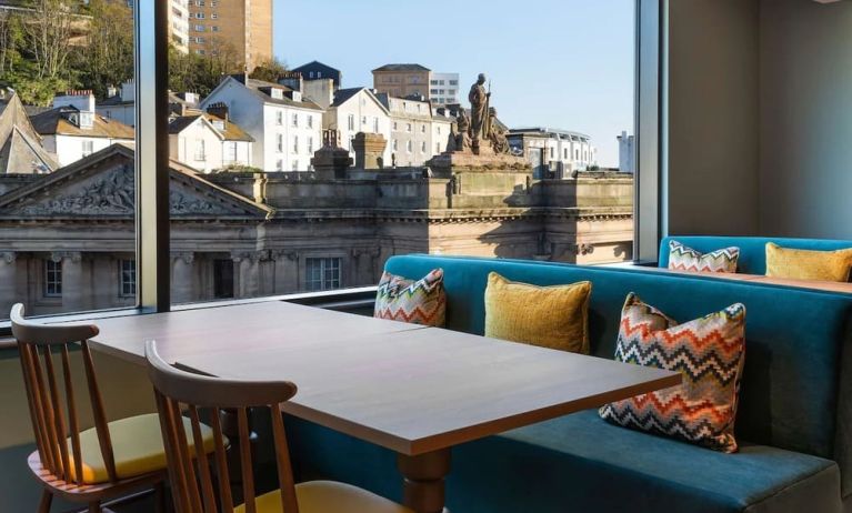 Dining area with a view at Hampton By Hilton Torquay.