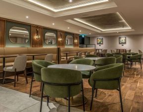 Hotel bar and comfortable lounge area at Hilton London Watford.