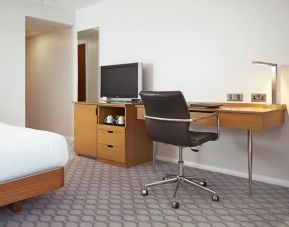 Day use room with TV and comfortable work desk at Hilton London Watford.