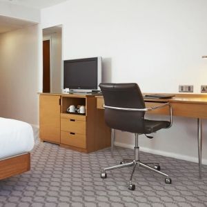 Day use room with TV and comfortable work desk at Hilton London Watford.