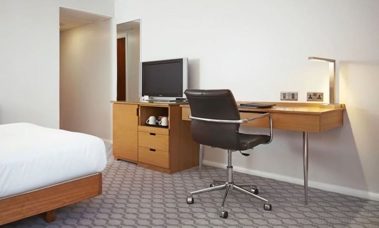 Day use room with TV and comfortable work desk at Hilton London Watford.