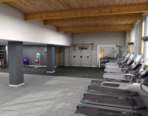 Fitness center with treadmills, machine and equipment at Hilton London Watford.