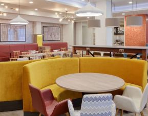 Colorful and comfortable dining area perfect for co-working at the Hampton by Hilton Manchester Northern Quarter.