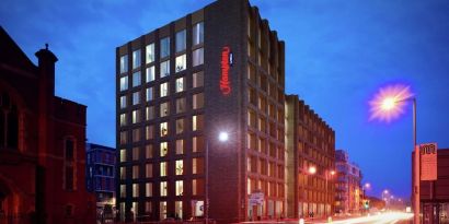 Hotel exterior and landmark at the Hampton by Hilton Manchester Northern Quarter.