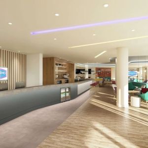 Bright lobby with lounge area at the Hampton by Hilton Manchester Northern Quarter.