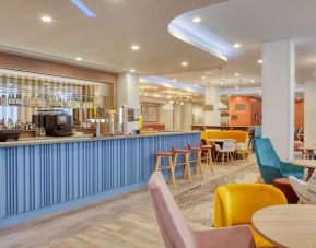 Hotel bar and lounge area at the Hampton by Hilton Manchester Northern Quarter.