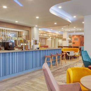 Hotel bar and lounge area at the Hampton by Hilton Manchester Northern Quarter.