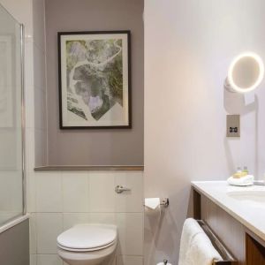 Guest bathroom with shower at DoubleTree By Hilton Edinburgh Airport.