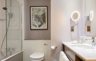 Guest bathroom with shower at DoubleTree By Hilton Edinburgh Airport.