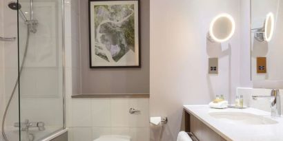 Guest bathroom with shower at DoubleTree By Hilton Edinburgh Airport.