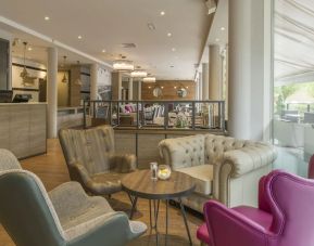 Lobby and coworking lounge at Hilton Garden Inn Bristol City Centre.