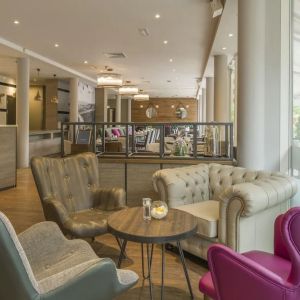 Lobby and coworking lounge at Hilton Garden Inn Bristol City Centre.