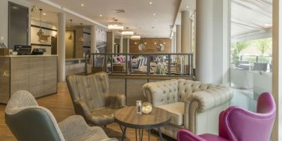 Lobby and coworking lounge at Hilton Garden Inn Bristol City Centre.