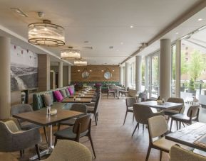 Dining area perfect for coworking at Hilton Garden Inn Bristol City Centre.