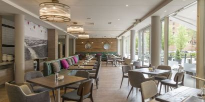 Dining area perfect for coworking at Hilton Garden Inn Bristol City Centre.