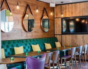 Dining area perfect for coworking at Hilton Garden Inn Glasgow City Centre.