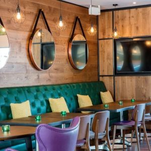 Dining area perfect for coworking at Hilton Garden Inn Glasgow City Centre.