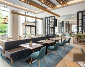 Spacious dining area perfect for coworking at Hilton Garden Inn Abingdon Oxford.