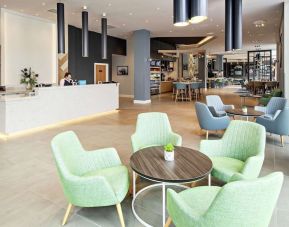 Lobby and coworking lounge at Hilton Garden Inn Abingdon Oxford.