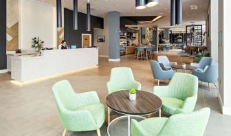 Lobby and coworking lounge at Hilton Garden Inn Abingdon Oxford.