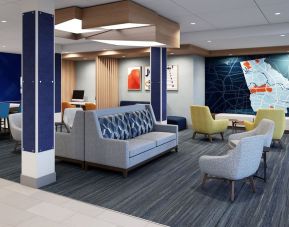 Lounge area at Holiday Inn Express & Suites Bronx.