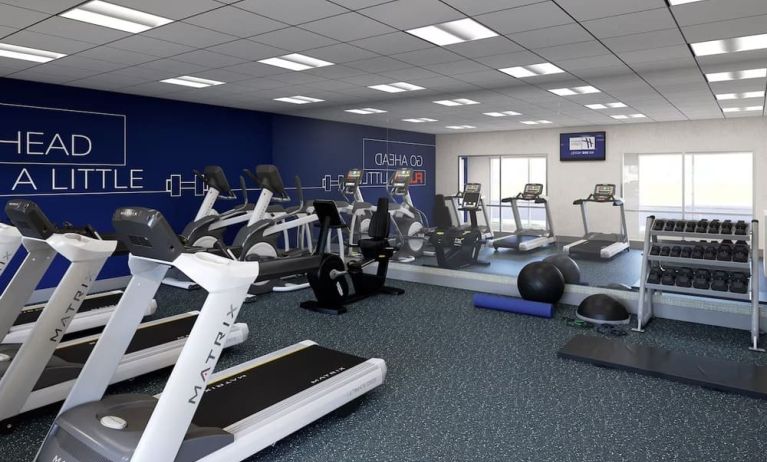 Fitness center at Holiday Inn Express & Suites Bronx.