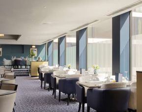 Spacious and elegant restaurant area perfect as workspace at the Hilton London Gatwick Airport.