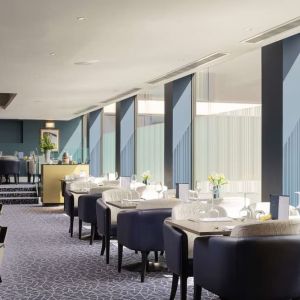 Spacious and elegant restaurant area perfect as workspace at the Hilton London Gatwick Airport.