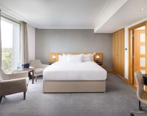 Day use guestroom with work desk and lounge area at the Hilton London Gatwick Airport.