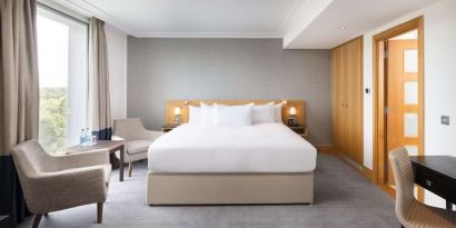 Day use guestroom with work desk and lounge area at the Hilton London Gatwick Airport.