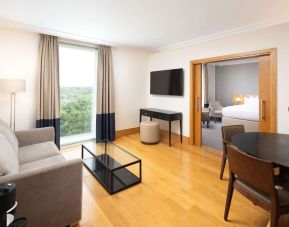 Family day use room with living room at the Hilton London Gatwick Airport.