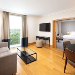 Family day use room with living room at the Hilton London Gatwick Airport.