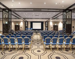 Spacious conference room for large crowds at the Hilton London Gatwick Airport.