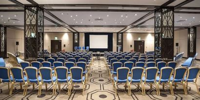 Spacious conference room for large crowds at the Hilton London Gatwick Airport.