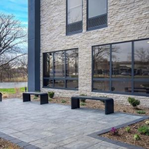 Outdoor seating and garden at Best Western Plus Secaucus Meadowlands.