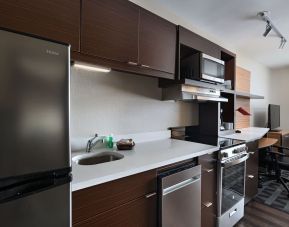 Kitchen area at TownePlace Suites Edgewood Aberdeen.