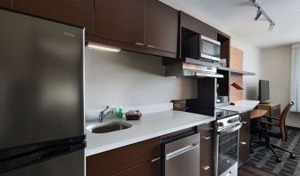 Kitchen area at TownePlace Suites Edgewood Aberdeen.