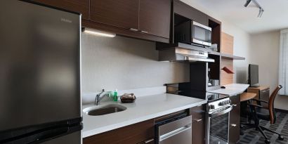 Kitchen area at TownePlace Suites Edgewood Aberdeen.