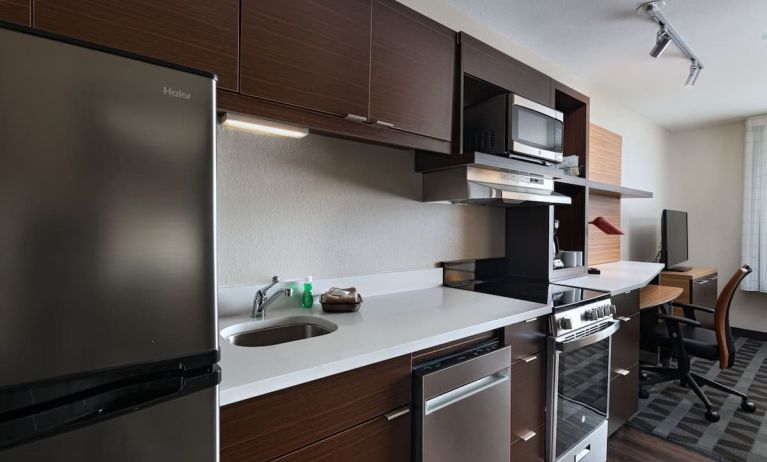 Kitchen area at TownePlace Suites Edgewood Aberdeen.