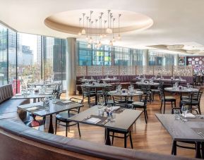 Spacious dining area perfect for coworking at Hilton London Wembley.