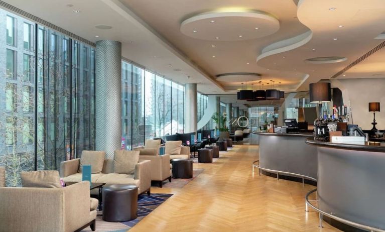 Dining area with natural light at Hilton London Wembley.