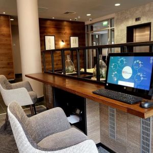 Business center with computer, printer and comfortable mobiliary at the Hilton Garden Inn Birmingham Brindleyplace.