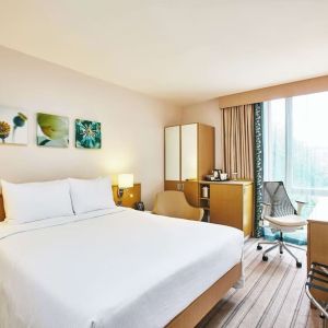 Bright hotel room with working station at the Hilton Garden Inn Birmingham Brindleyplace.