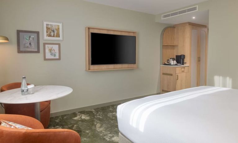 Day use guest room with lounge area and TV at the DoubleTree by Hilton Bristol North.