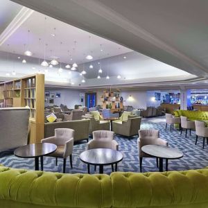 Hotel bar and lounge area with stylish and comfortable workspace at the DoubleTree by Hilton Bristol North.