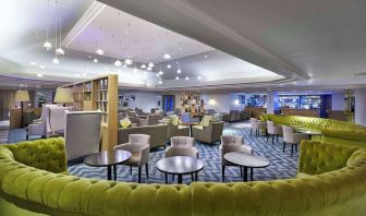 Hotel bar and lounge area with stylish and comfortable workspace at the DoubleTree by Hilton Bristol North.