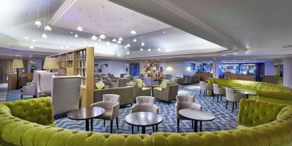 Hotel bar and lounge area with stylish and comfortable workspace at the DoubleTree by Hilton Bristol North.